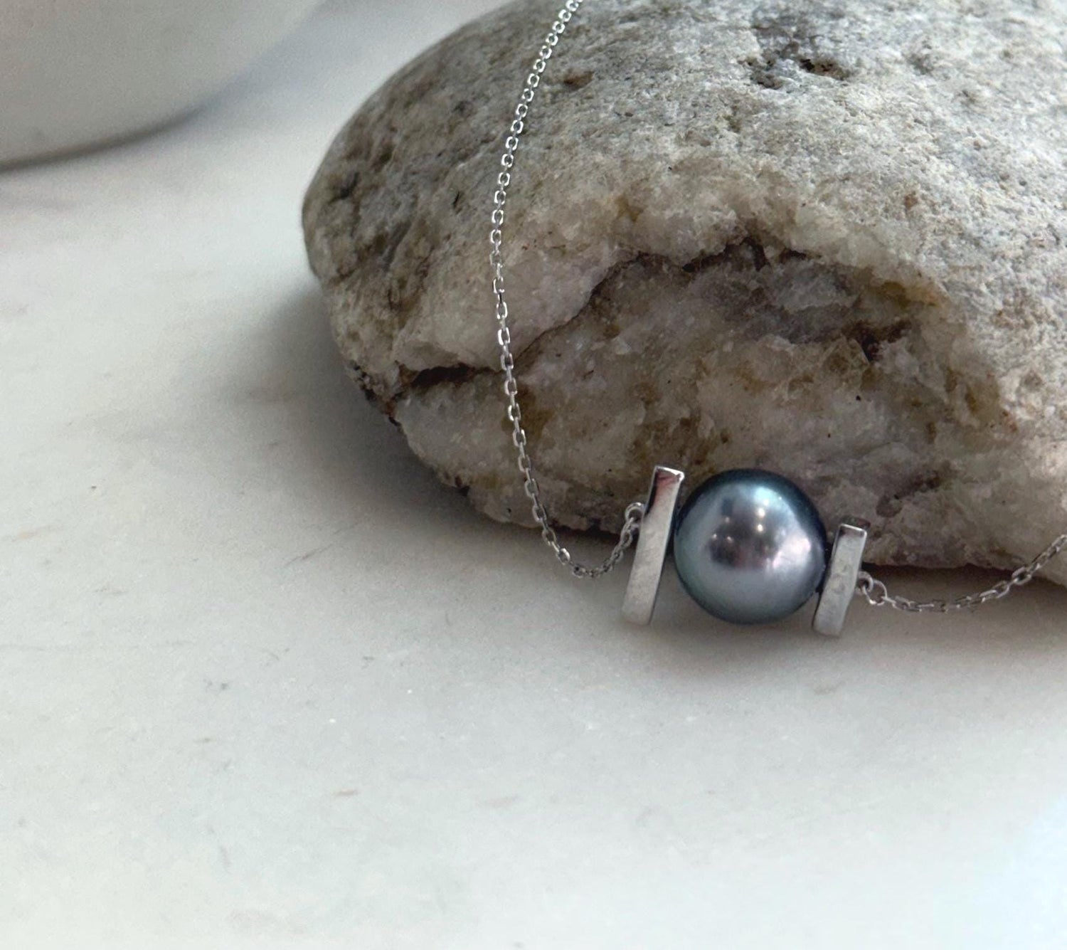Genuine South Sea golden pearl paired with Tahitian pearl on an S925 sterling silver pendant.