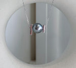 Luxury saltwater pearl pendant with golden South Sea pearl and Tahitian pearl for women.