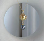 Elegant double pearl necklace showcasing 9.5-10.2mm cultured South Sea and Tahitian pearls.