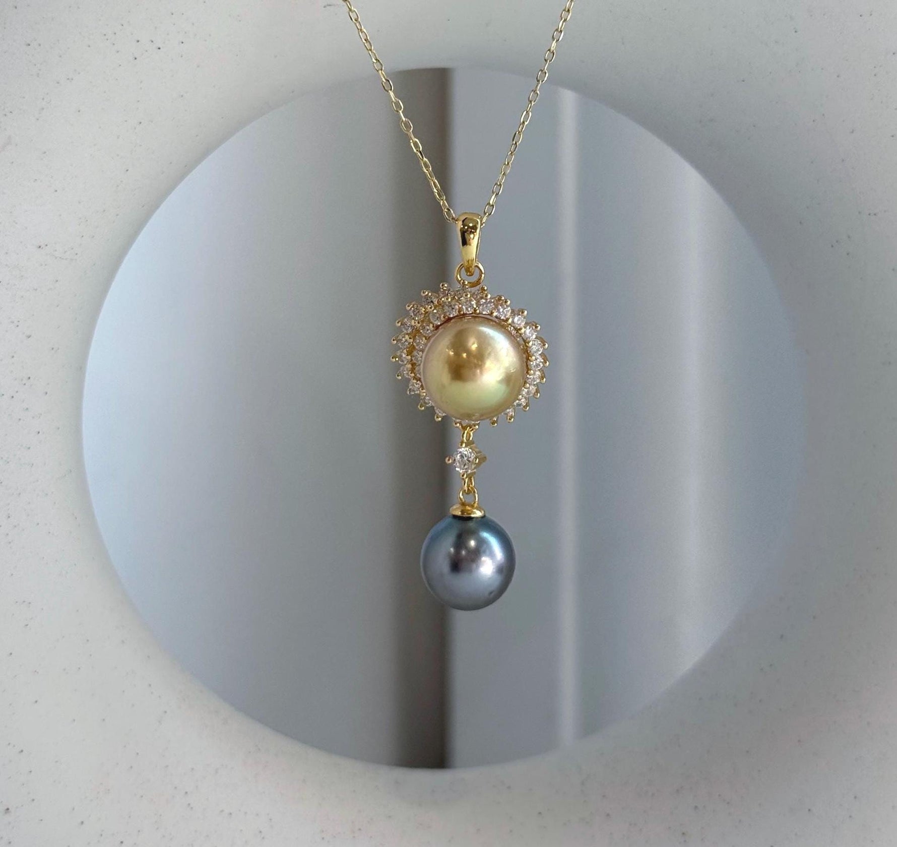 Elegant double pearl necklace showcasing 9.5-10.2mm cultured South Sea and Tahitian pearls.
