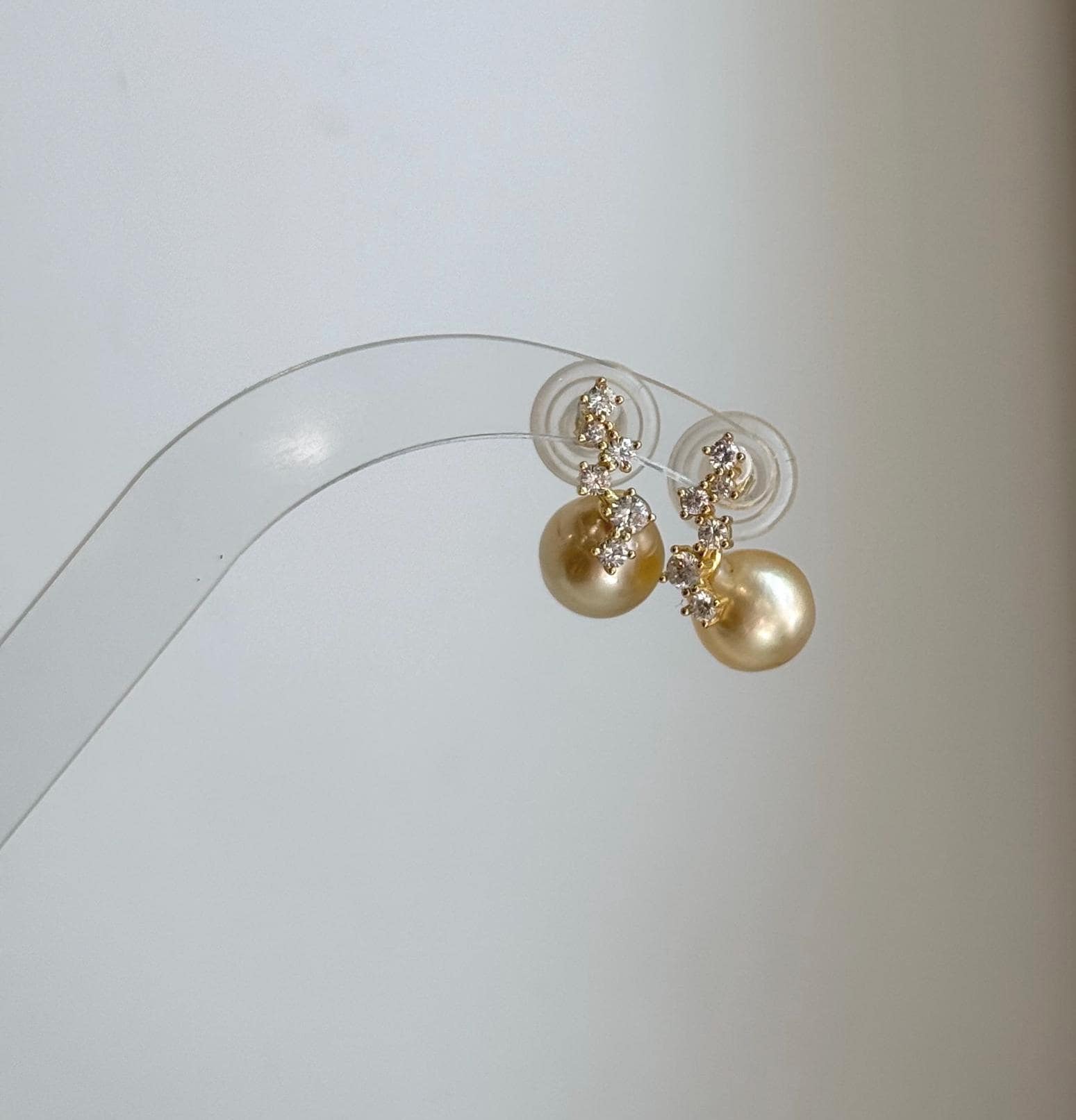 Natural South Sea golden saltwater pearl stud earrings in S925 sterling silver.