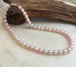 Genuine pale pink pearl necklace with mirror luster and sterling silver clasp