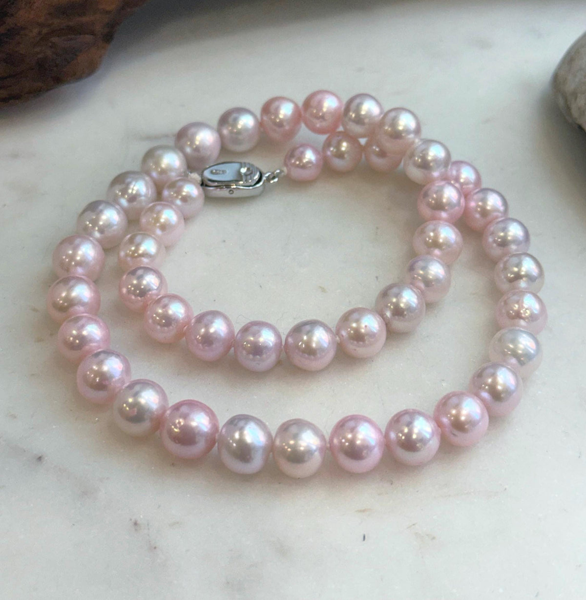 Detailed view of S925 sterling silver pearl necklace clasp