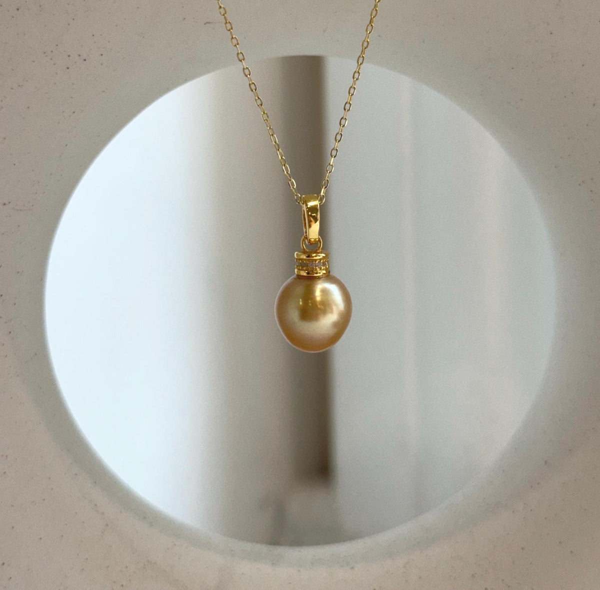 Classic South Sea pearl jewelry featuring a natural deep tea gold ocean pearl pendant with mirror luster and S925 sterling silver bail