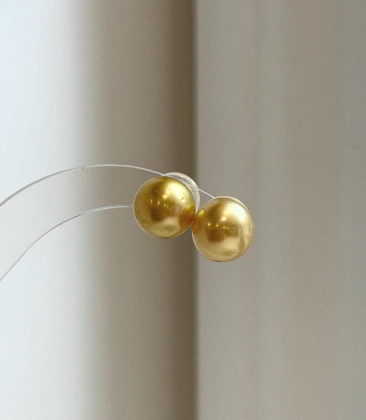 Mirror luster South Sea pearl earrings for elegant everyday wear.
