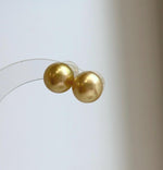 Mirror luster South Sea pearl earrings for elegant everyday wear.