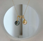 Double South Sea golden and Tahitian pearl pendant with mirror luster.