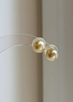 Handcrafted S925 silver South Sea pearl stud earrings.