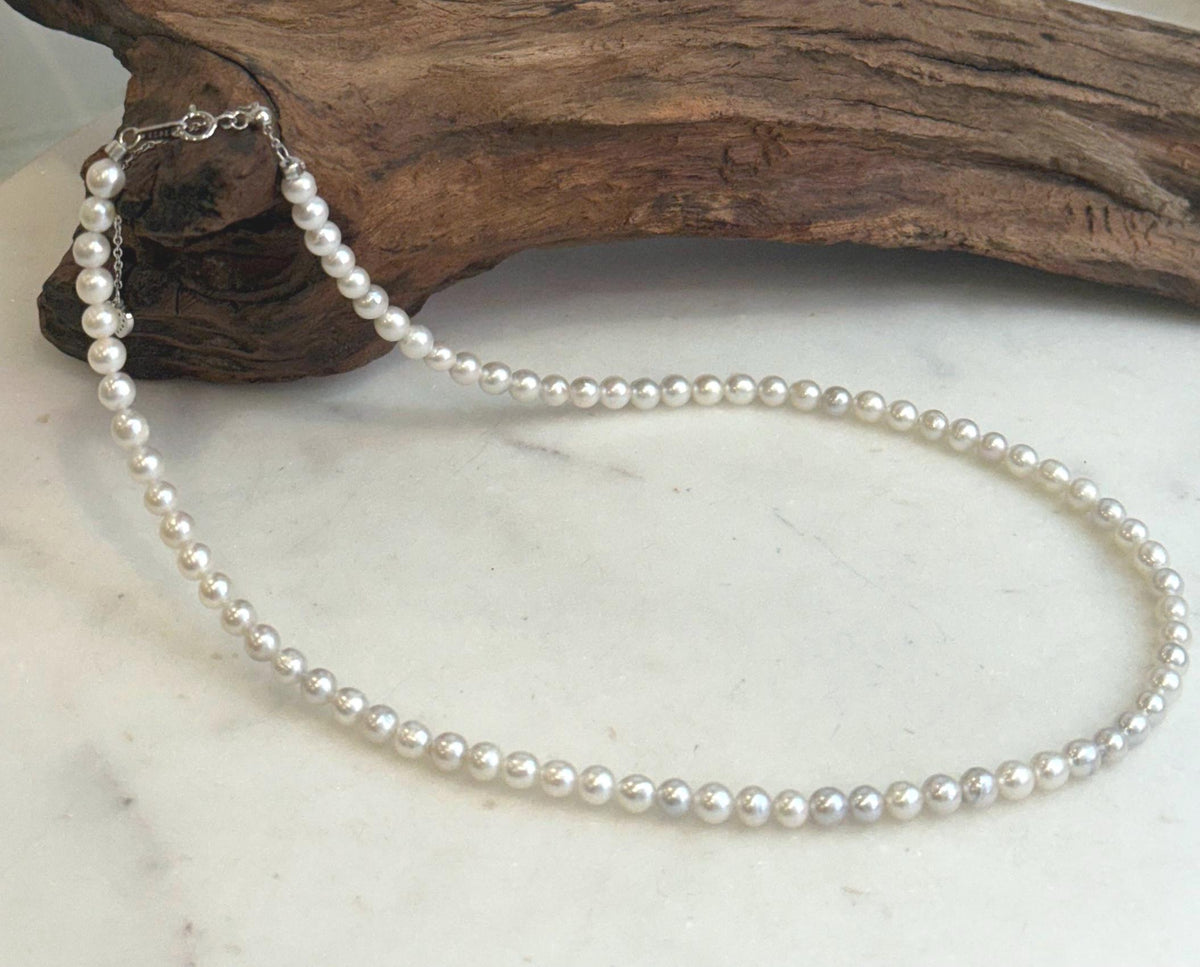 Minimalist white pearl strand