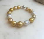 Hand-selected South Sea pearls in luxury bracelet.