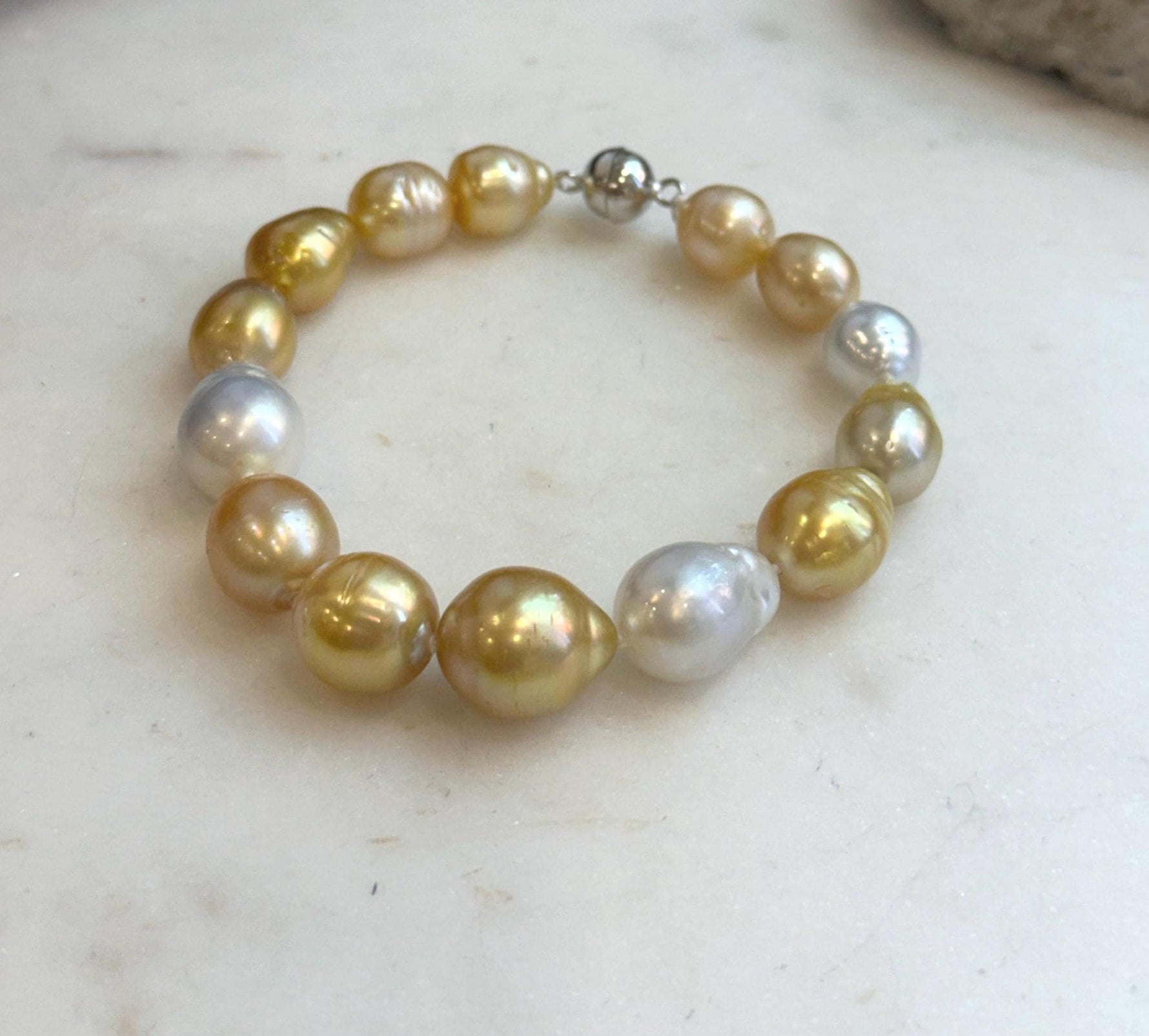Hand-selected South Sea pearls in luxury bracelet.