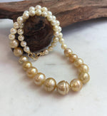 Genuine South Sea Golden and Akoya pearl necklace with extreme luster.