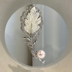 Elegant leather brooch with genuine Edison pearl for weddings, parties, and daily wear.