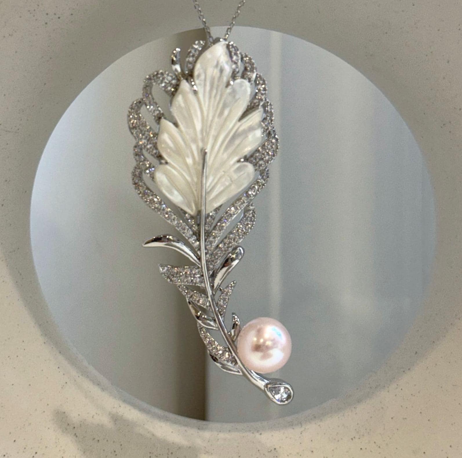 Elegant leather brooch with genuine Edison pearl for weddings, parties, and daily wear.