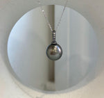 Minimalist S925 sterling silver pendant with natural Tahitian pearl.