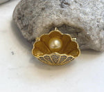 Luxury pearl brooch pendant for formal wear and special occasions.