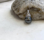 Luxury Tahitian pearl necklace with genuine saltwater pearl and minimalist silver setting.