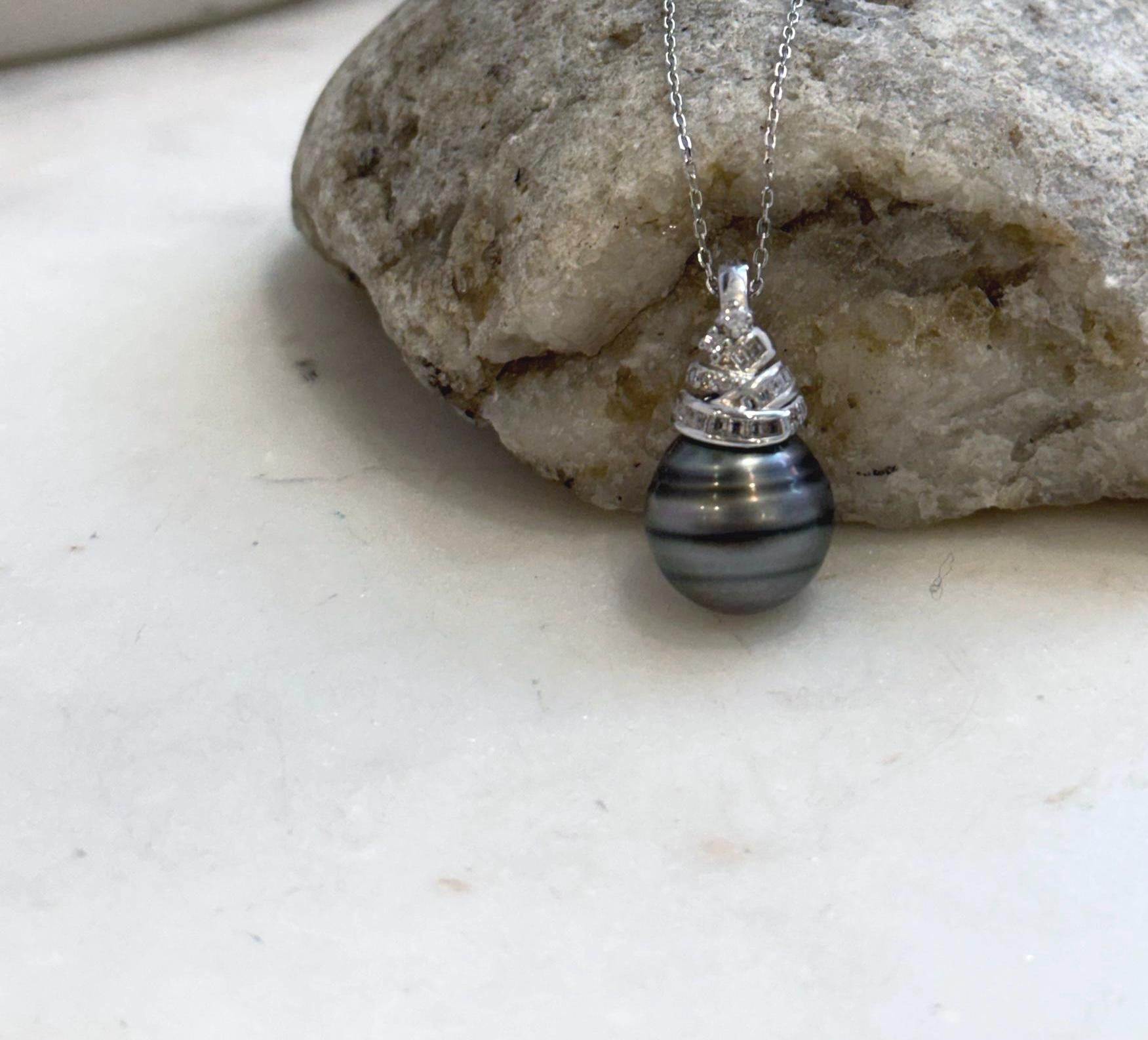 Luxury Tahitian pearl necklace with genuine saltwater pearl and minimalist silver setting.