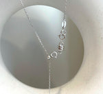 Handmade Tahitian black pearl pendant showcasing a rare large saltwater pearl with mirror shine.