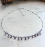 Elegant Keshi pearl necklace with organic freshwater pearls and sparkling Tanzanite.