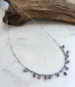 Minimalist pearl and Tanzanite necklace adjustable to 18.3 inches.