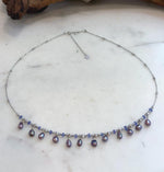 Close-up of natural purple Keshi pearls showing exceptional mirror-like luster.