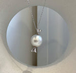 Unique candy-inspired pearl necklace featuring a large Australian South Sea white pearl and sterling silver.