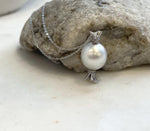 Luxury white South Sea pearl pendant handcrafted in S925 sterling silver with a whimsical candy design.