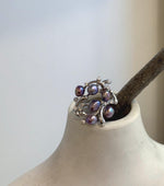 Genuine purple freshwater Keshi pearl floral ring with mirror luster.