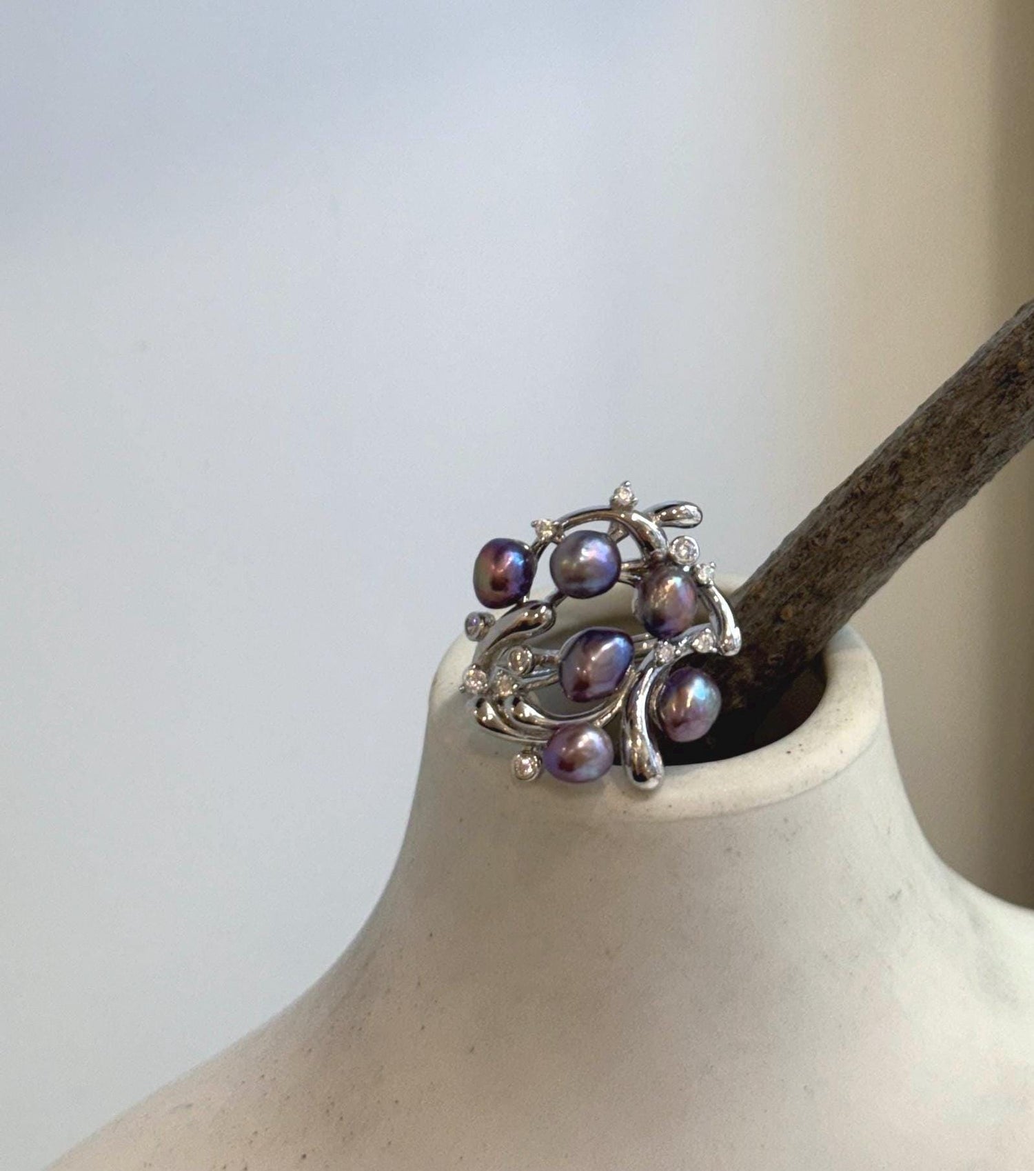 Genuine purple freshwater Keshi pearl floral ring with mirror luster.