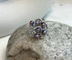 Luxury floral sterling silver ring with genuine freshwater pearls.
