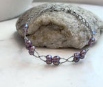 Genuine freshwater Keshi pearl bracelet with 16 mirror-luster pearls.