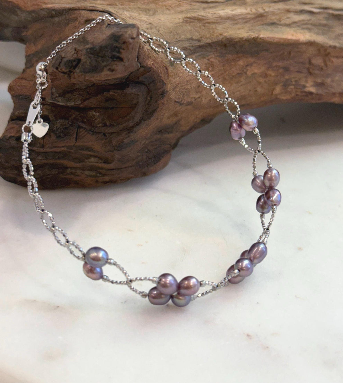 Adjustable S925 sterling silver bracelet featuring natural 4–5mm Keshi pearls.