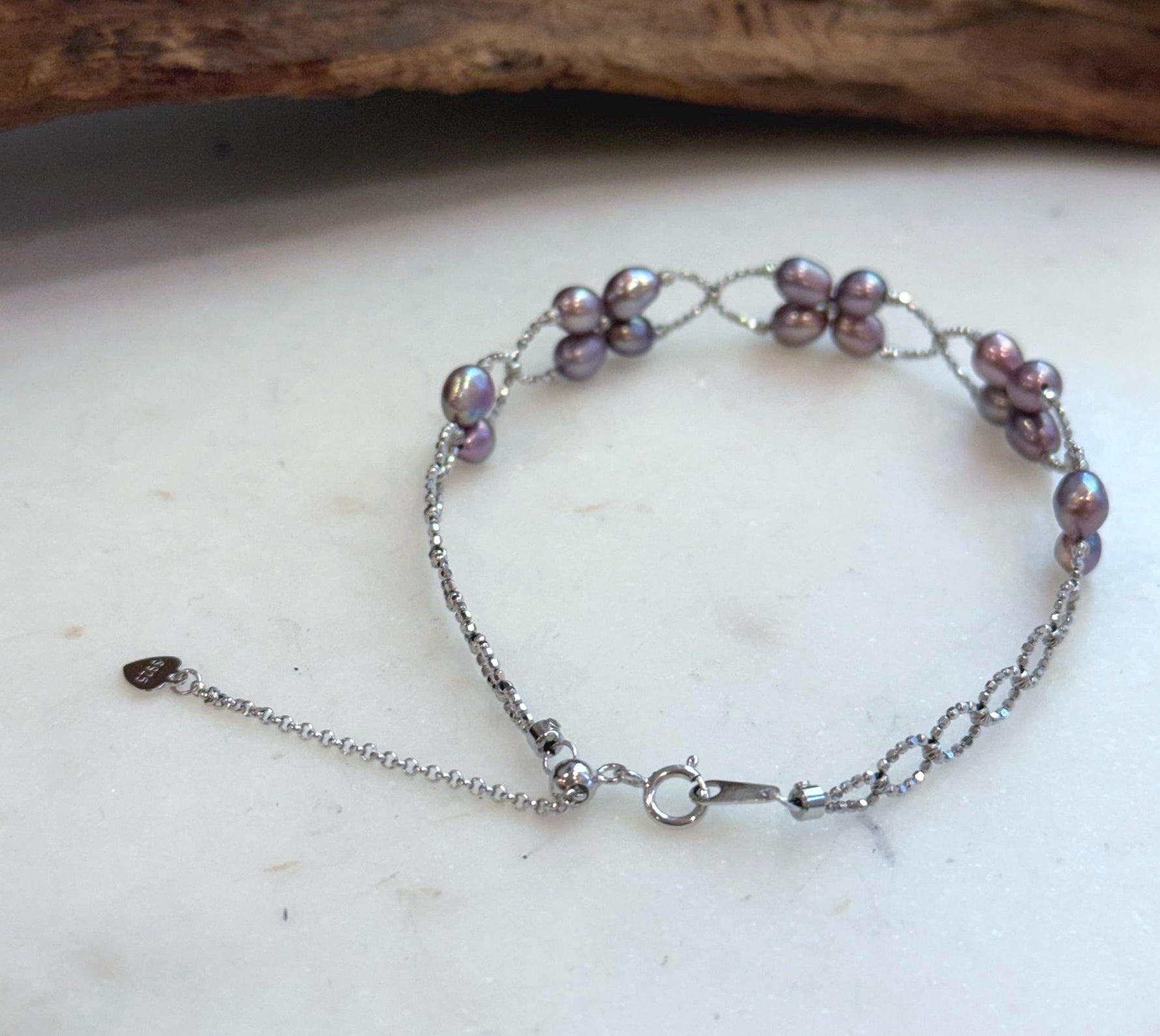 Close-up of genuine 4–5mm Keshi pearls showcasing exceptional mirror shine.