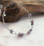 Natural organic Keshi pearls on a sterling silver adjustable bracelet.