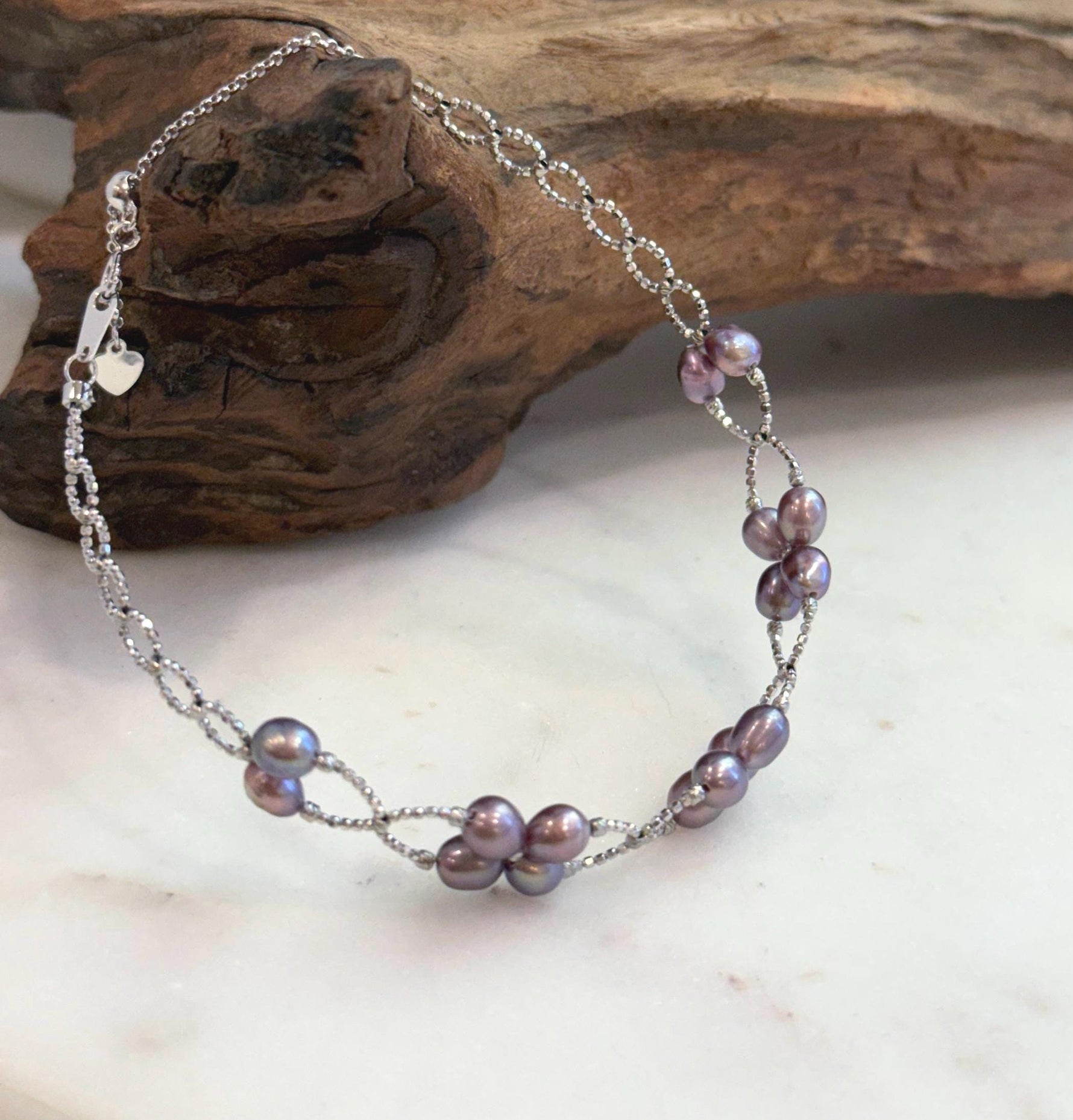 Natural organic Keshi pearls on a sterling silver adjustable bracelet.