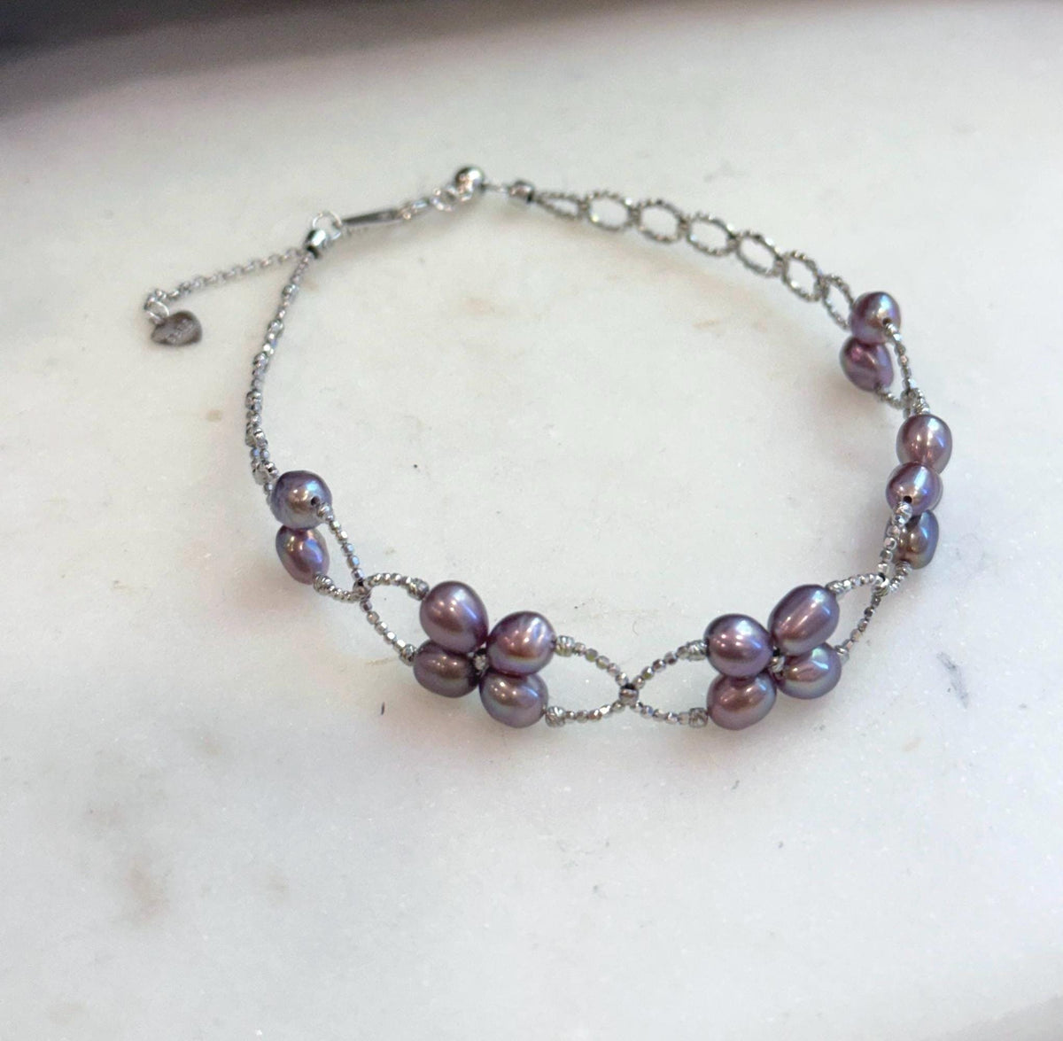 Genuine Keshi pearl bracelet handcrafted with 16 organic freshwater pearls in S925 sterling silver.
