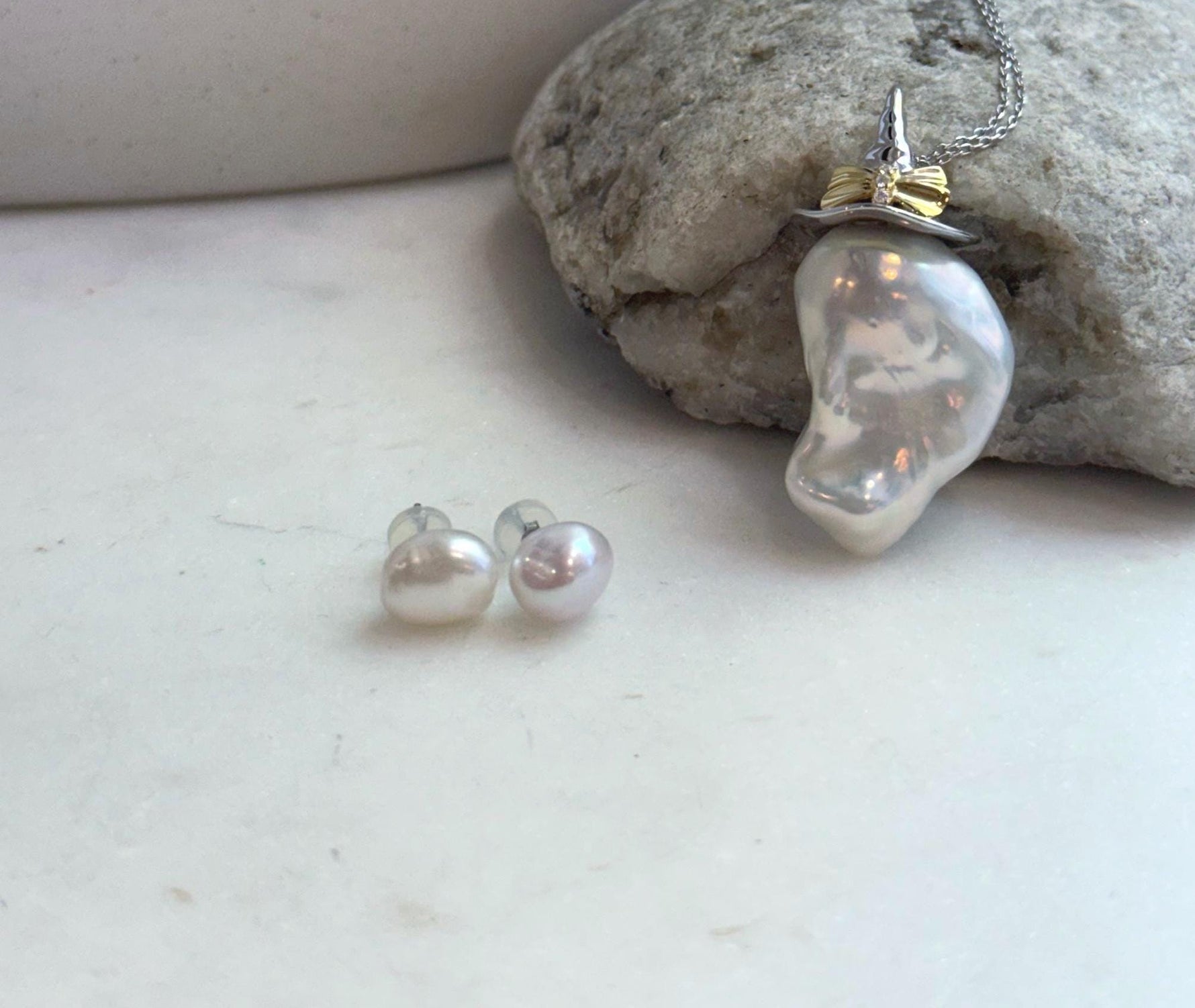 Minimalist pearl necklace with natural baroque freshwater pearl and matching white pearl stud earrings for women.