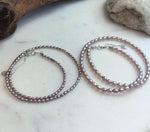 Genuine metallic rose rice pearl necklace with mirror luster.