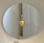 High-luster golden pearl necklace gift for birthdays, anniversaries, and weddings.