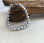 Genuine Japanese Akoya pearl bracelet featuring 21 ocean pearls with exceptional mirror luster.