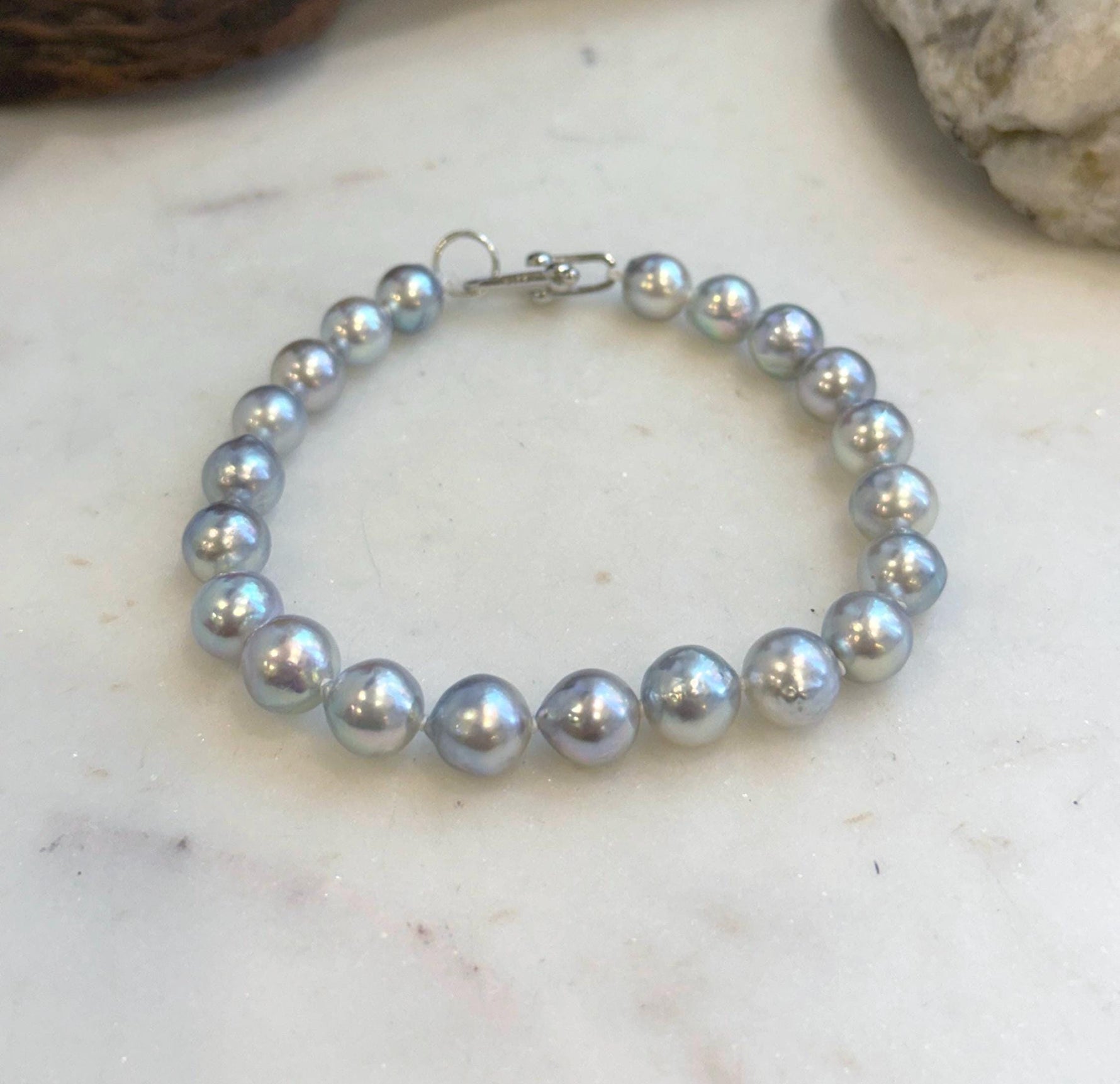 Elegant 6.8–8.3mm Akoya pearl bracelet with S925 sterling silver clasp.