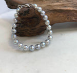 Hand-strung Japanese Akoya pearl bracelet with 21 genuine saltwater pearls and radiant mirror luster.