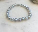 Premium Akoya pearl bracelet displaying smooth, round pearls with brilliant natural shine.