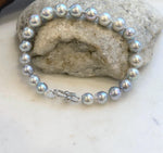 Luxury Akoya pearl jewelry handcrafted with graduated 6.8–8.3mm genuine pearls for timeless elegance.