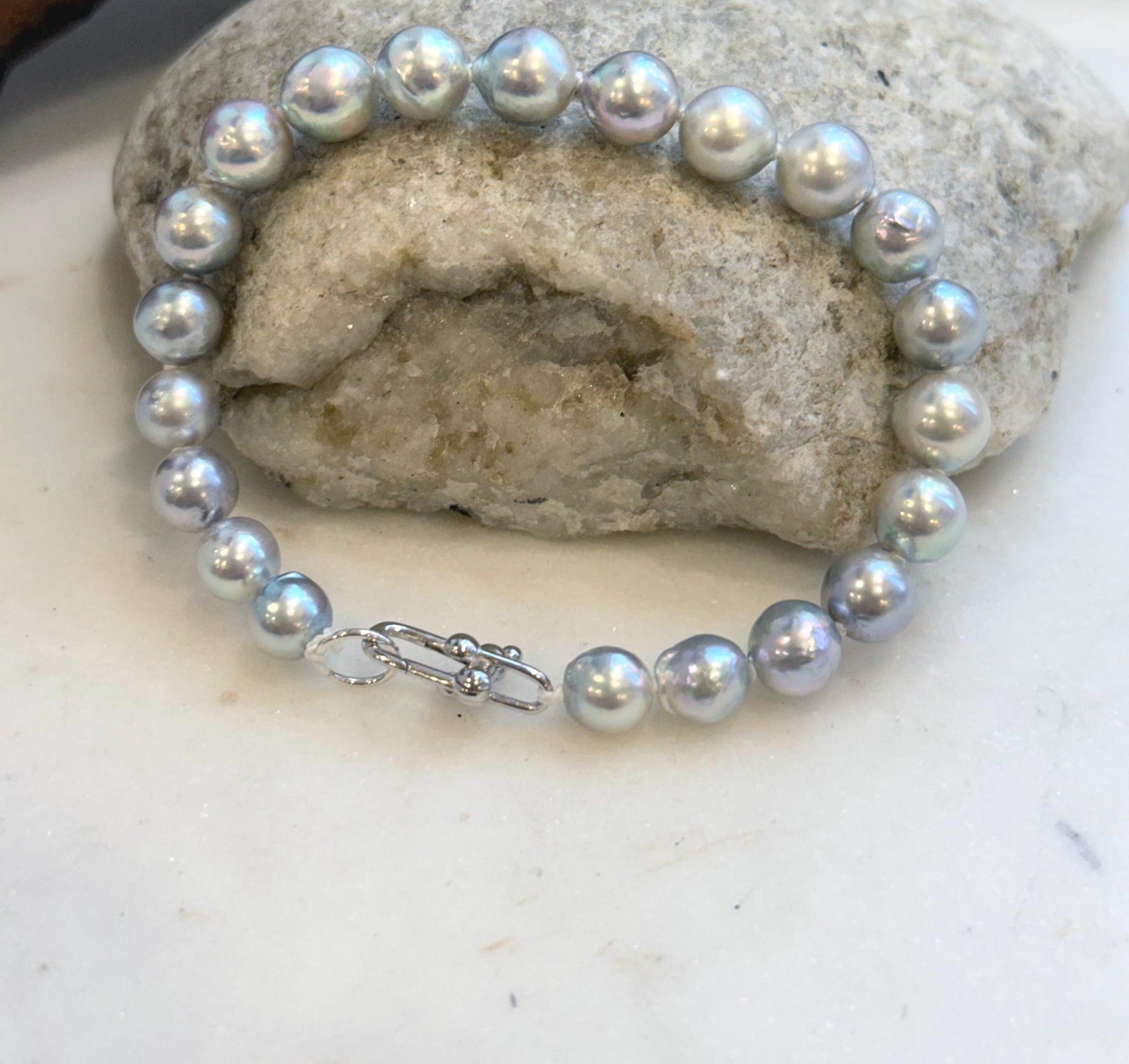 Luxury Akoya pearl jewelry handcrafted with graduated 6.8–8.3mm genuine pearls for timeless elegance.