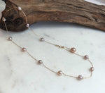 Genuine Akoya ocean pearl layered with Keshi pearl satellite necklace, minimalist bridal jewelry.