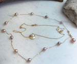 S925 sterling silver necklace set with Akoya pearl pendant and natural freshwater Keshi pearls.