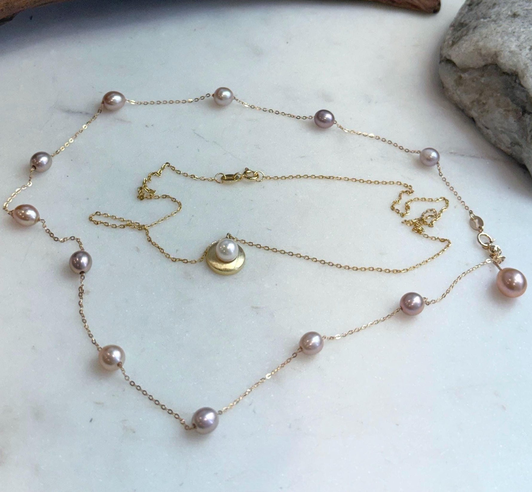 Handmade Akoya saltwater pearl necklace layered with freshwater Keshi pearl sterling silver chain.