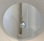 Elly’s 11mm silver Tahitian ocean pearl pendant with strong luster
